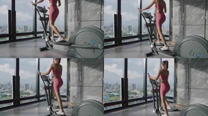 美女在健身房锻炼。