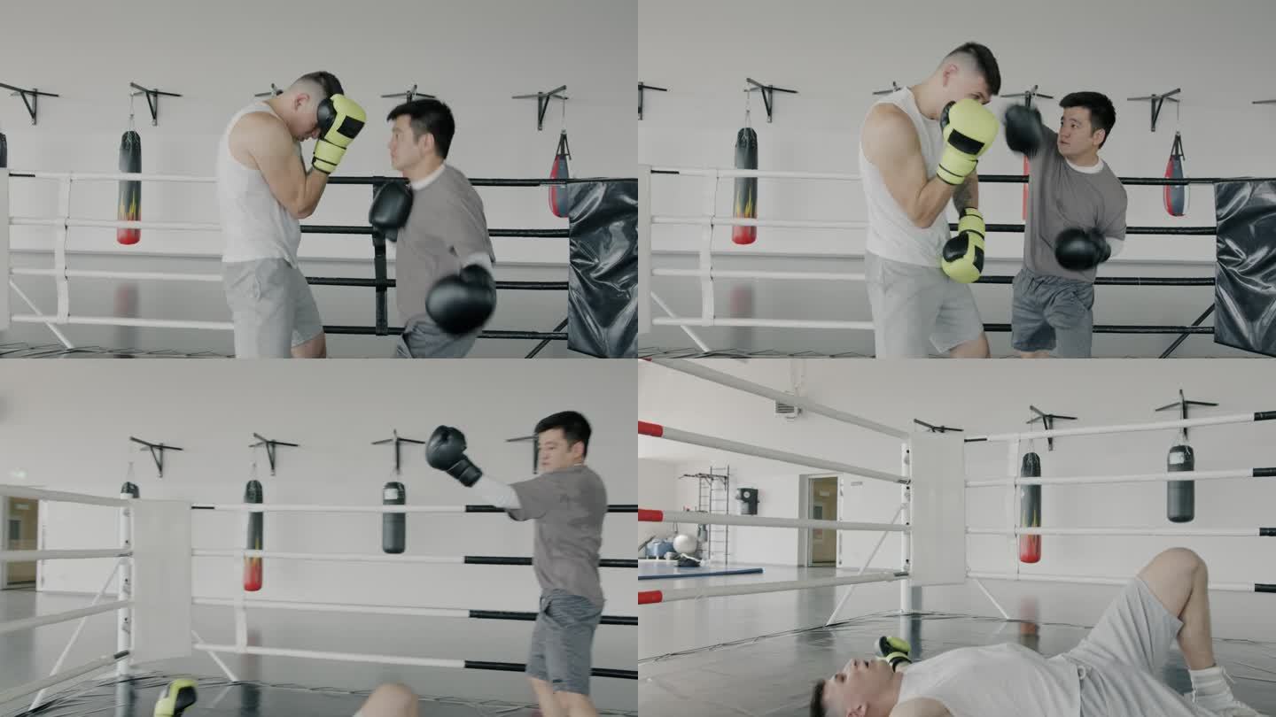 年轻男子的慢动作，高加索人和亚洲人练习拳击动作，在健身房训练出拳
