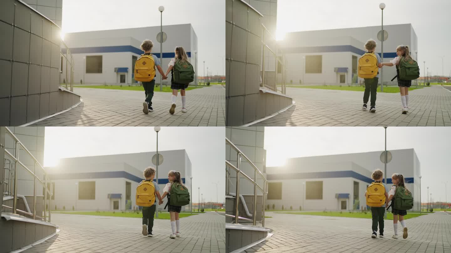 小同学，男孩和女孩手牵着手，走在学校的院子里，去上课