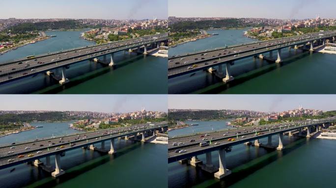 伊斯坦布尔金角的4K航拍全景电影。无人机在光天化日之下朝着海上的桥梁急速飞行。