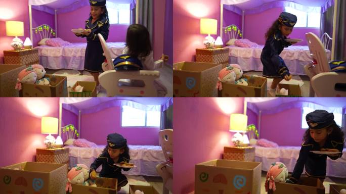 一个小女孩在家里的卧室里假扮空姐