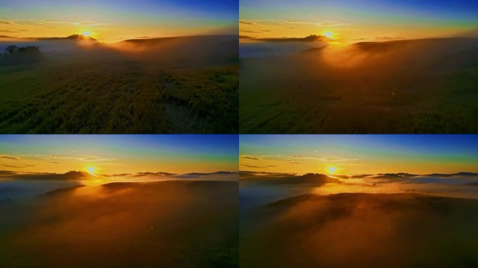 无人机视角的日出在雾蒙蒙的田园风光之上