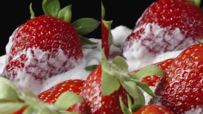一个大盘子，放上鲜奶油和草莓，慢慢旋转。多莉滑块极端特写。垂直视频。