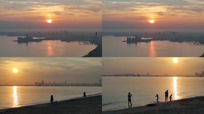 【海南海口】海边日出看日出的游客