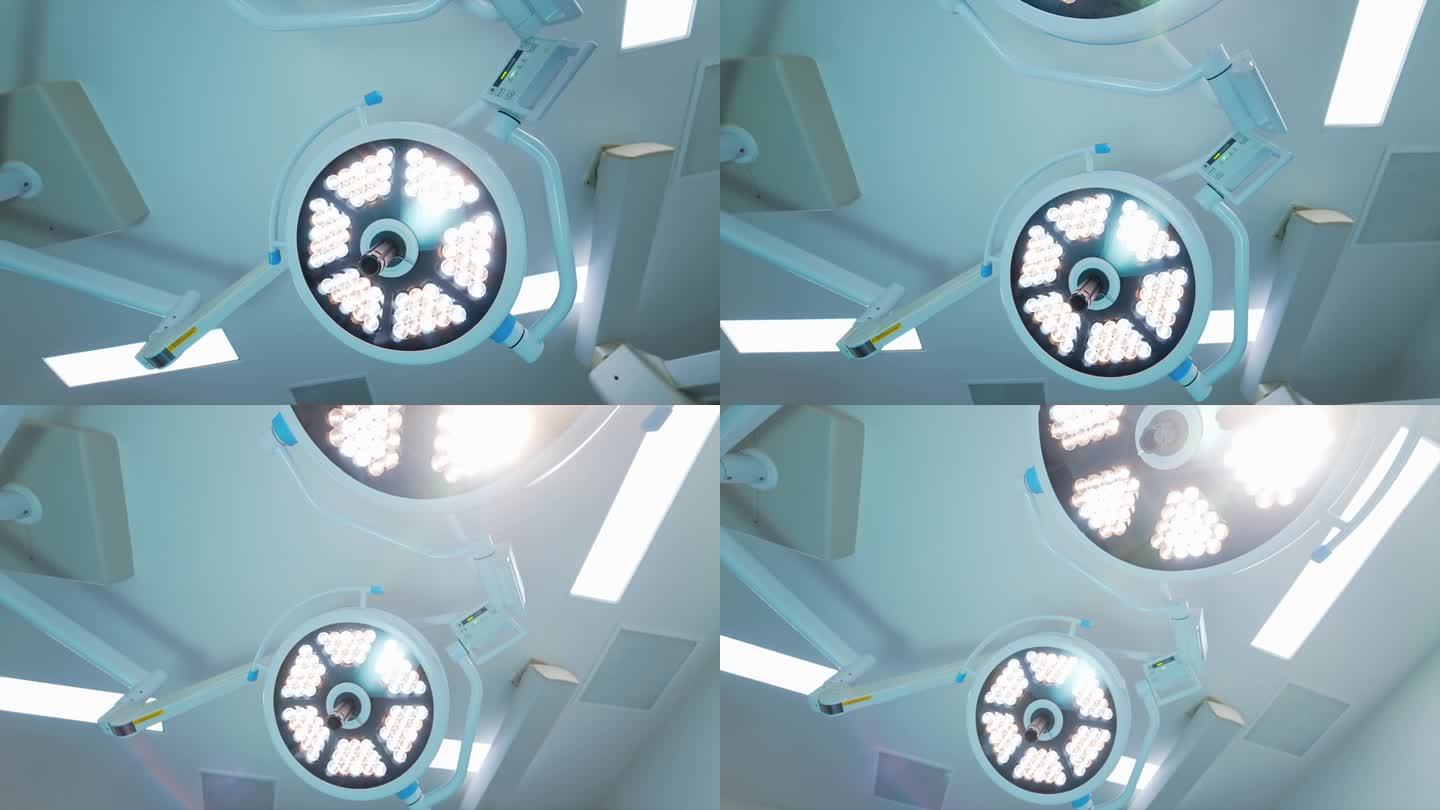 打开了手术室天花板上的圆灯。战区现代照明设备的低角度观察。