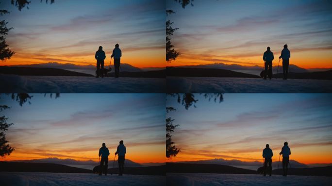 黄昏时分，两名女徒步者在雪地上欣赏风景