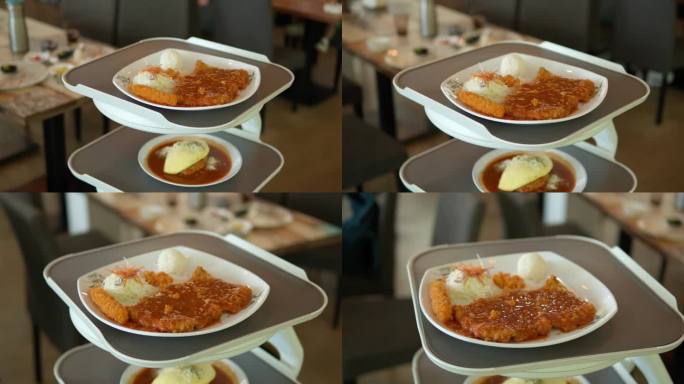 送餐机器人服务员在韩式餐厅的托盘平台上送餐-跟踪运动