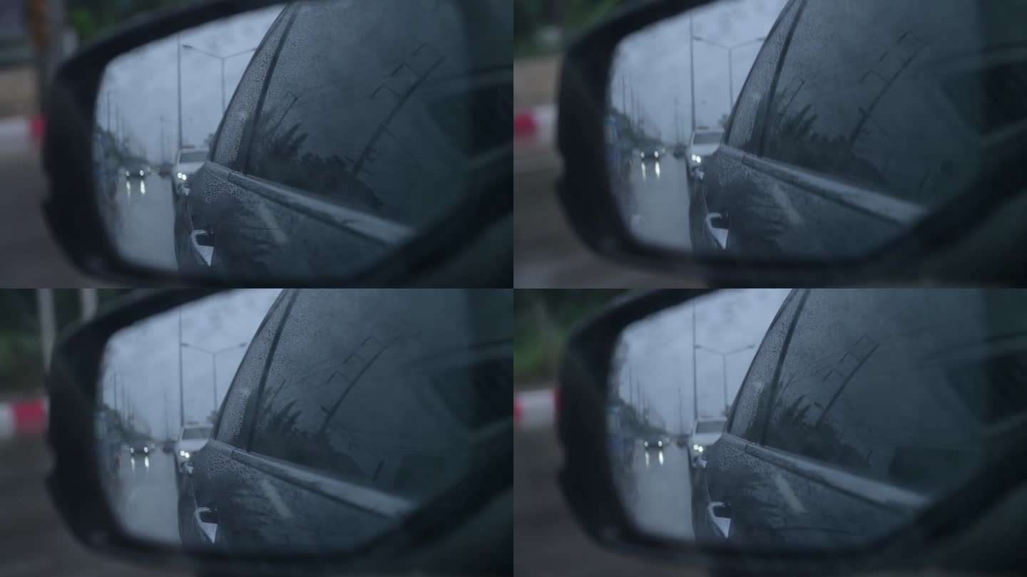 傍晚和雨天行驶在路上的汽车近景后视镜，慢动作场景