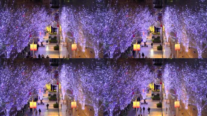 人们在装饰着圣诞彩灯的六本木Keyakizaka散步