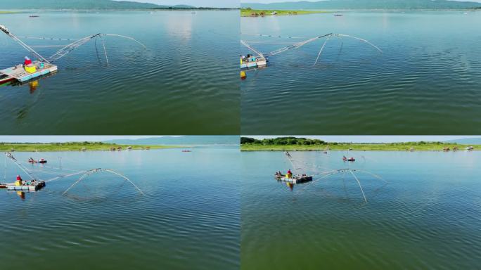 鸟瞰图，一名男子在泰国的湖中钓鱼。