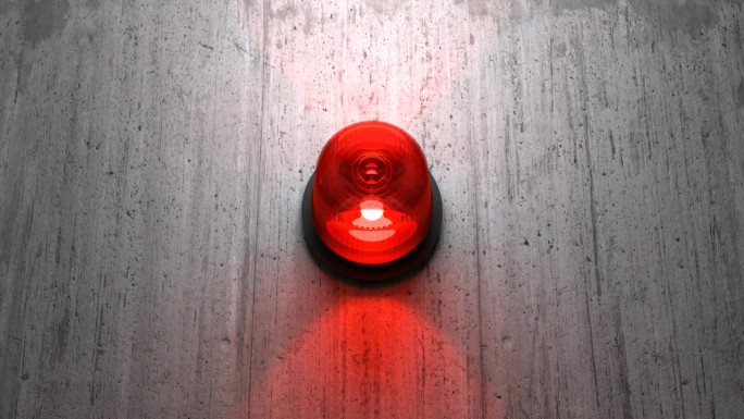混凝土墙上的红色紧急警报器光回路