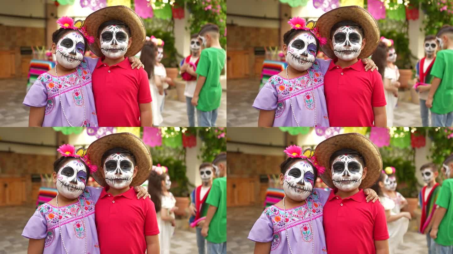 孩子们的肖像与糖骷髅脸油漆在死亡的庆祝活动的一天