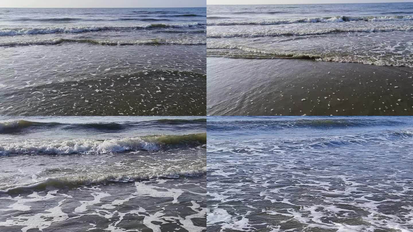 沙滩海浪潮汐涨潮波浪波涛汹涌浪花冲击海边