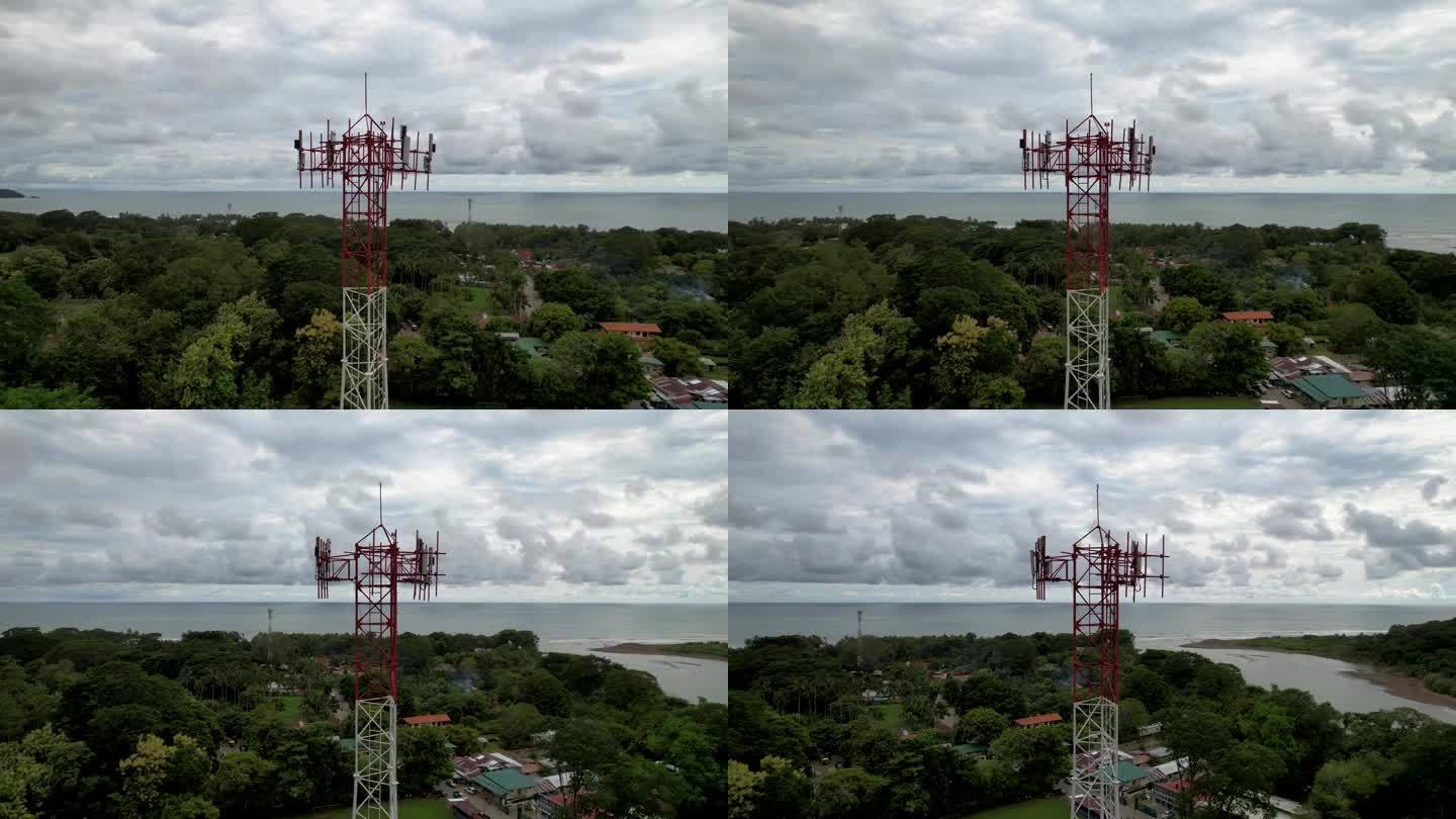 近距离航拍的蜂窝，电信，g5塔在哥斯达黎加的山和海滩