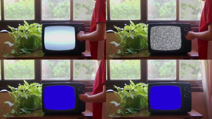 小男孩打开蓝屏复古电视，4K分辨率。