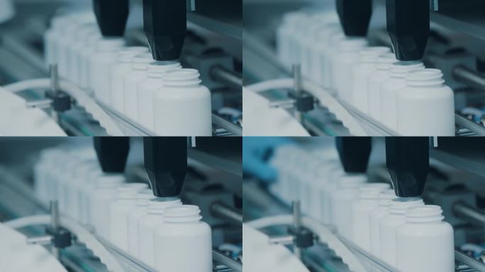 4K输送机，在生产线上移动白色的空塑料管，并填充胶囊。工厂里的自动机器。现代高科技药物厂。特写，DO