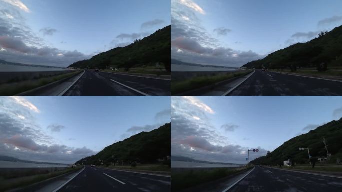 日本，冲绳:日落时分，在名护市附近开车。