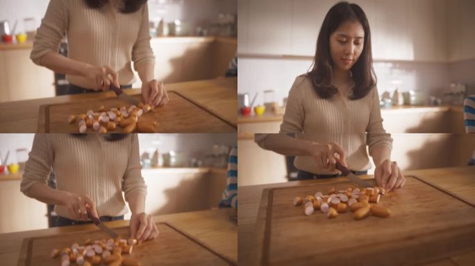 美丽的韩国女人在家里的厨房里切香肠的肖像。专心致志、无忧无虑的家庭主妇用刀和菜板为家人准备一顿美味的