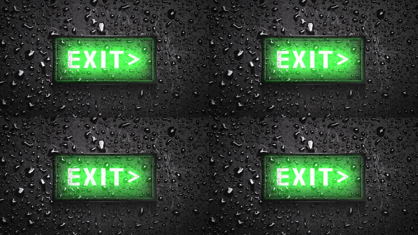 安全出口标志湿墙背景。绿色发光灯出口标志箭头方向板。