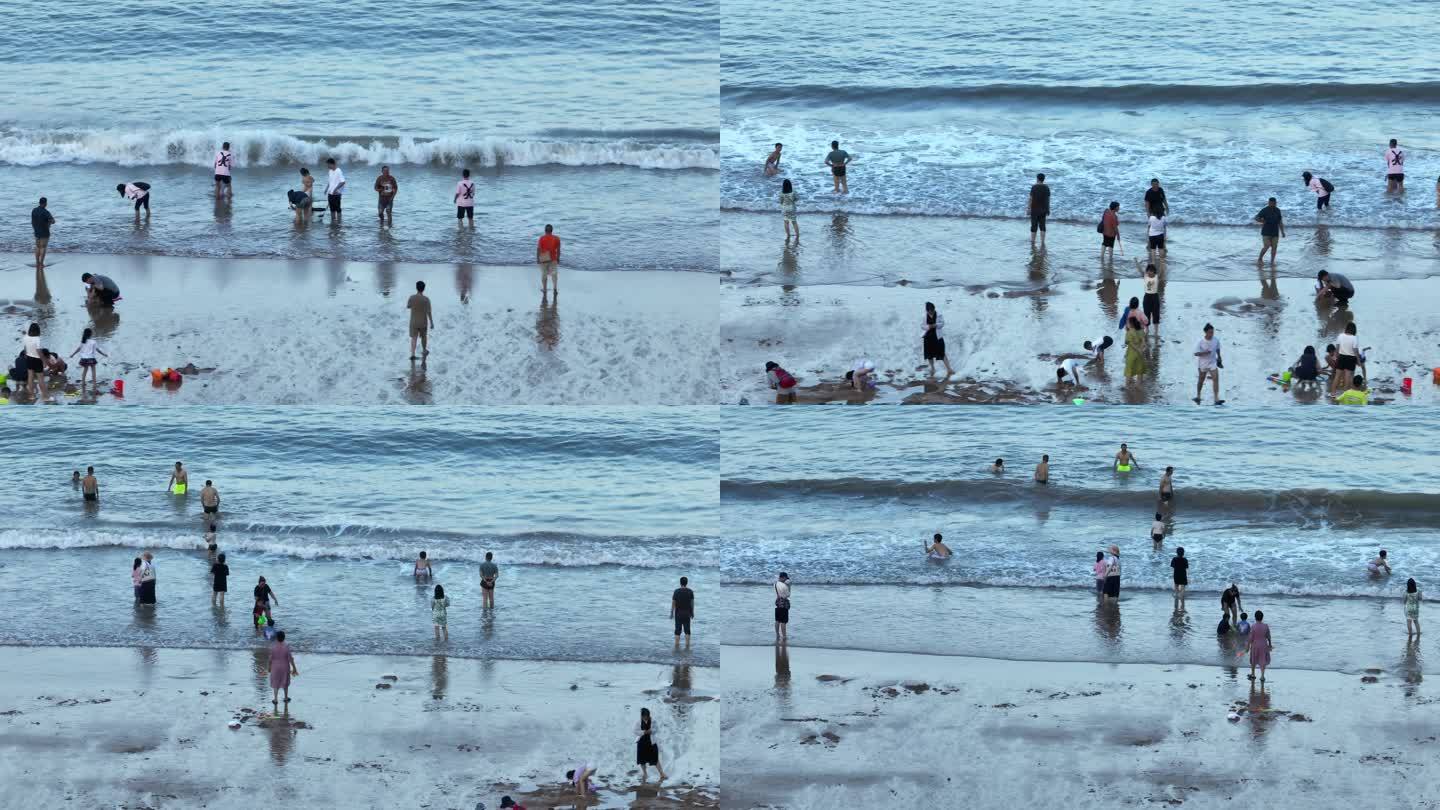 航拍海浪拍打沙滩人群节假日游客爆满