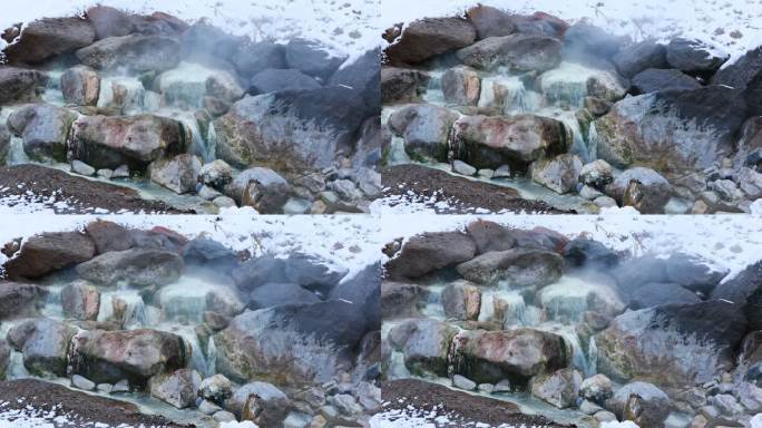 固定的自然场景，水流入热气腾腾的天然温泉被雪包围在科罗拉多州的山区
