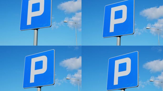 停车标志显示免费车位。交通停车标志与干净的天空和光线。汽车尾气排放成为城市生态的最大问题