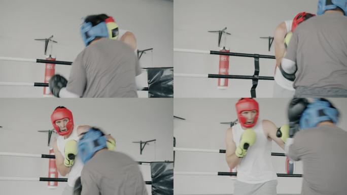 戴着头盔和手套的职业拳击手在现代体育馆里训练出拳