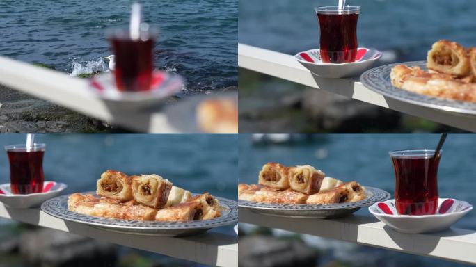 土耳其环饼和春卷(Kol Böreği)，土耳其茶和博斯普鲁斯海峡，Üsküdar伊斯坦布尔(土耳其