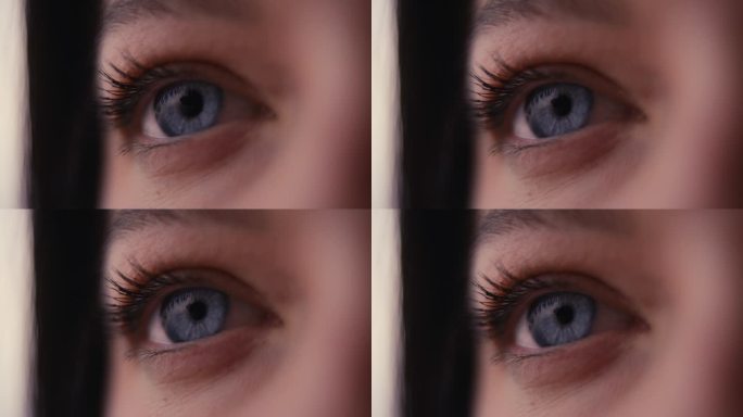 微距工作室拍摄的女人的眼睛眨眼与睫毛和瞳孔的特写