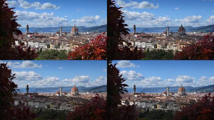 从米开朗基罗广场看佛罗伦萨的城市景观，蓝天多云。从左至右依次为市政厅和圣玛丽亚大教堂。时间流逝。