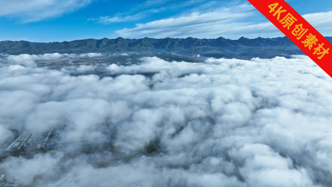 航拍4K高原云海平流雾云层上的大山