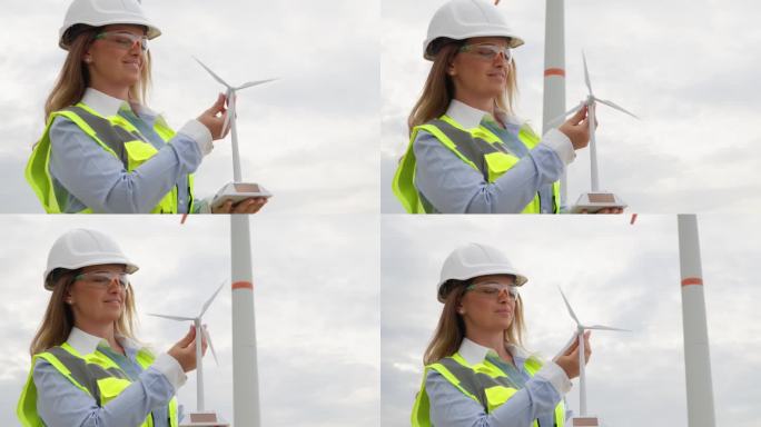 绿色科技女研究员:设计师规划未来，风力涡轮机将成为清洁电力的主要来源。有远见的工程师:一名妇女制定了