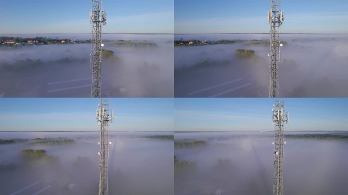 塔式天线电信手机鸟瞰图，蜂窝5g 4g手机无线电发射机。提供高速现代5g通信网服务。日出时的云雾和天