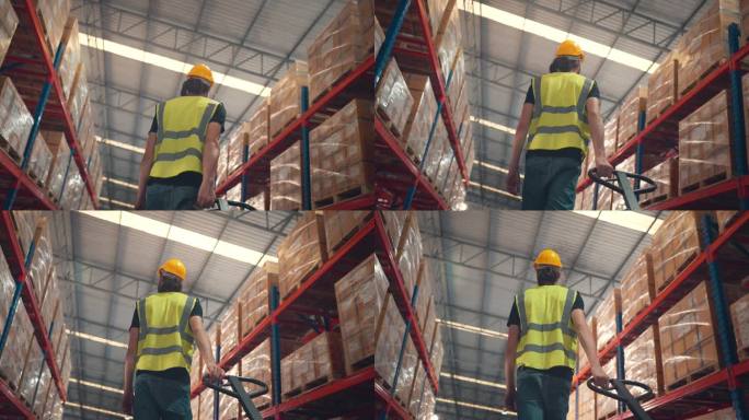 后视图-在大型仓库零售行业工作的工人，使用手拖卡车的人，在产品配送物流中心工作的人。运输服务