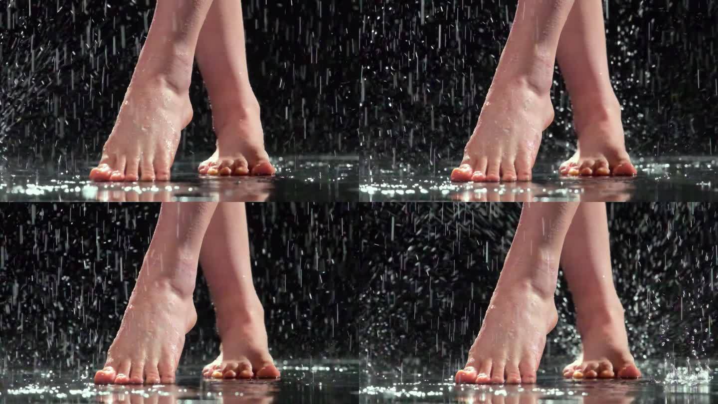 雨中裸露在反射面上的女性脚