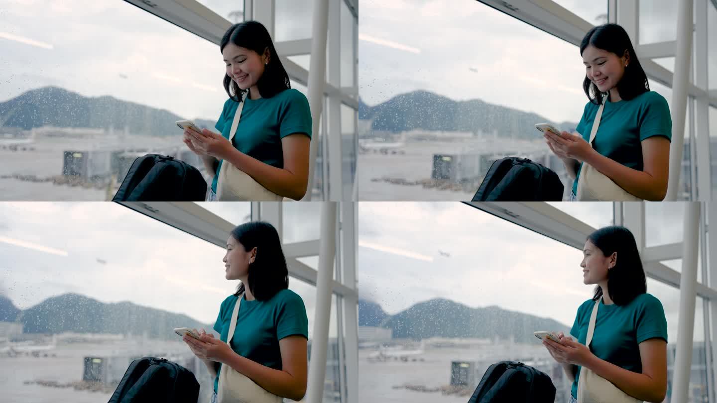 玩手机通讯，在候机楼内等候登机的女子旅行。