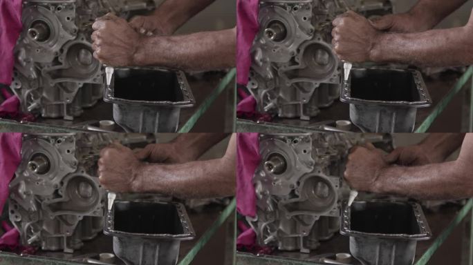 汽车发动机曲轴箱盖在修理厂用密封液体垫片修理