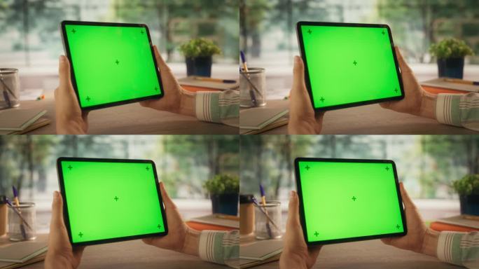 市场经理在平板电脑上用模拟绿色屏幕垂直显示器进行视频演示。网络传播理念，网络品牌，商业推广