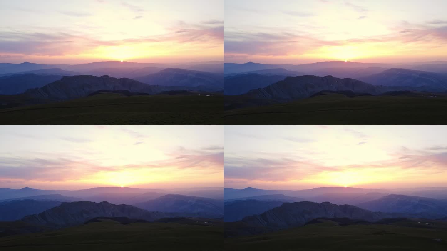 风景如画的黎明日落日出山山顶景观明亮的太阳天空地平线空中静态视图