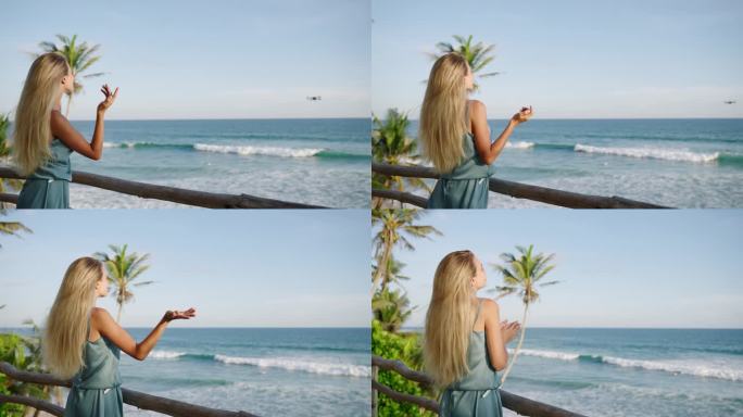 无人机拍摄金发女子视频博主在热带岛屿上与海景交谈。斯里兰卡的女视频博主在无人机上拍摄视频。旅行者在慢