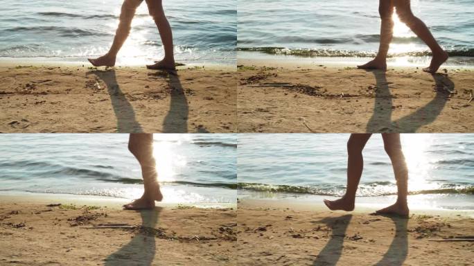 女人的腿沿着波罗的海的海岸走