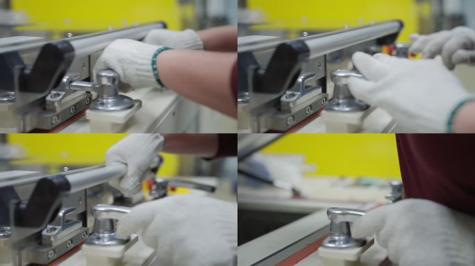 一个戴着热防护手套的科学家的手打开了制造商锁着的加工设备的入口。