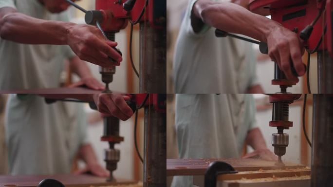用工业机器在木头表面钻洞的慢动作。在车间手工操作木工设备，细节特写