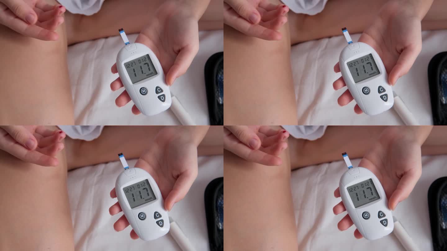 十几岁的女孩在家里的床上测量血糖水平。