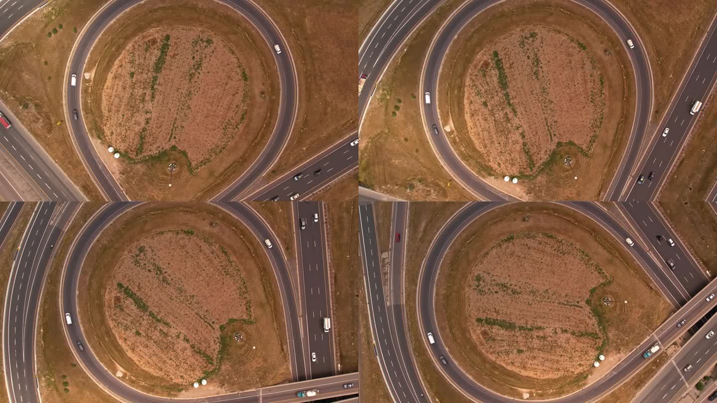 高速公路环形出口或入口，用于高速通勤和道路交通规避。汽车交通枢纽发展。从上面看加拿大的高速公路。