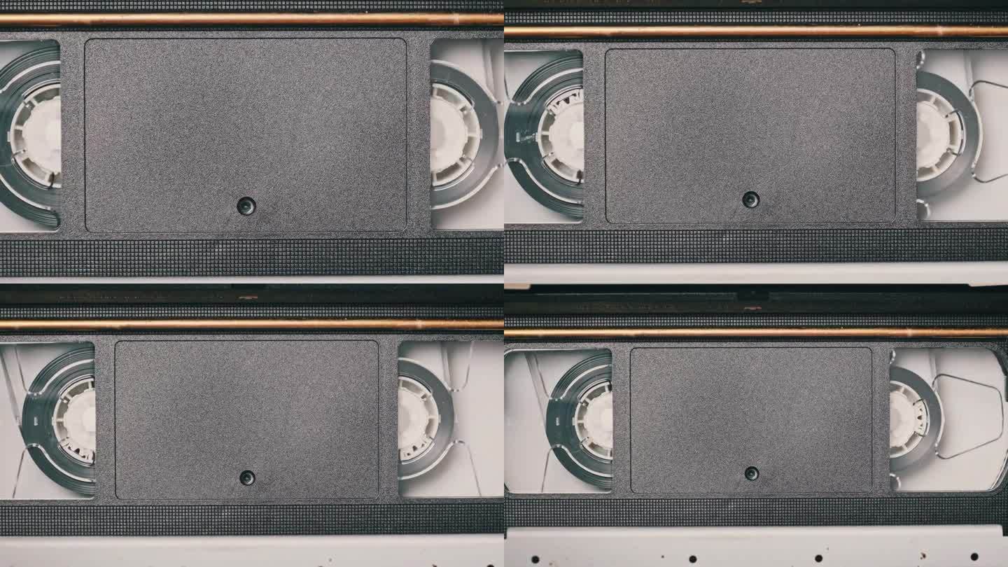 在VCR磁带录音机内旋转的录像带卷，俯视图