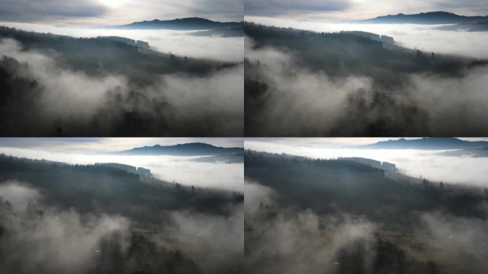 飞过山顶的云层。山峰高耸，清晨日出，自然景观优美