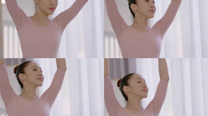 一名韩国女子在镜子前跳芭蕾舞。