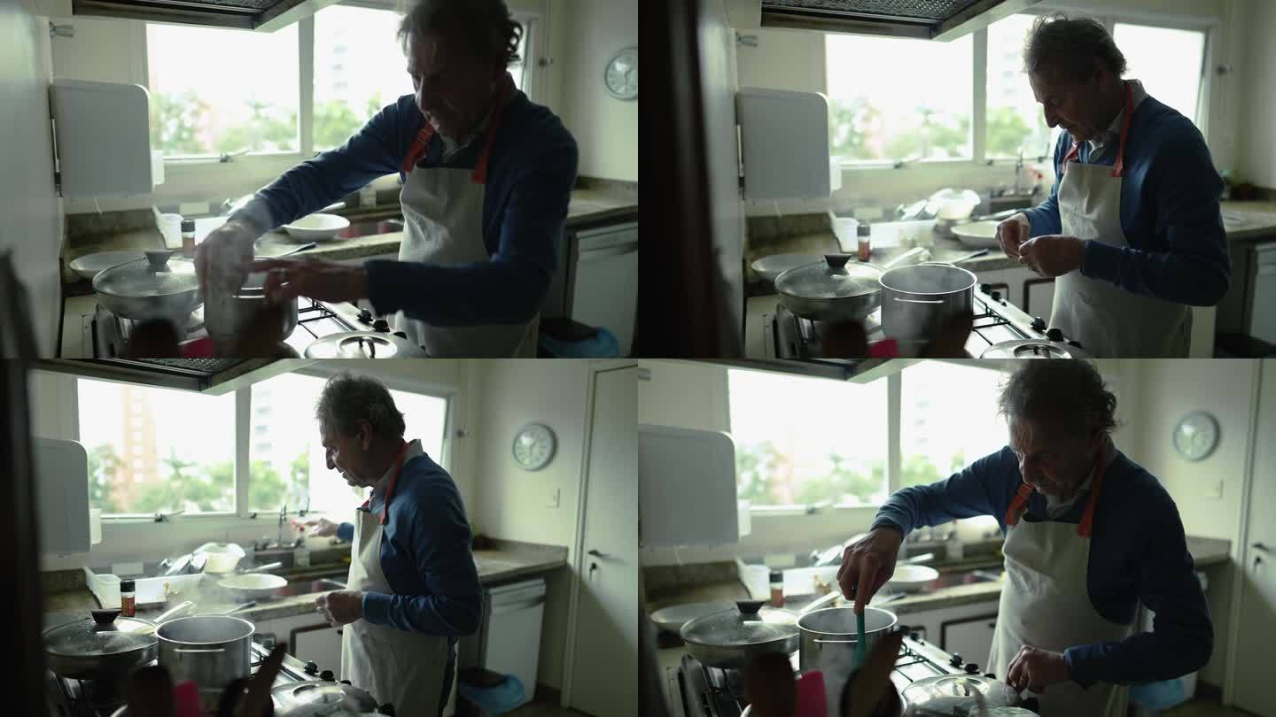 高级厨师长在工作-系围裙的老人在厨房炉子上做饭