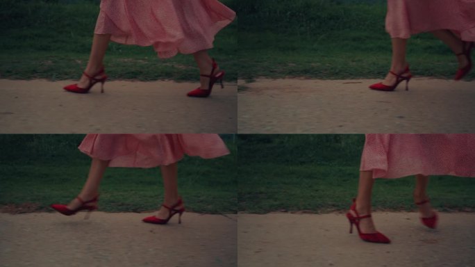 穿红鞋的女人的脚在走
